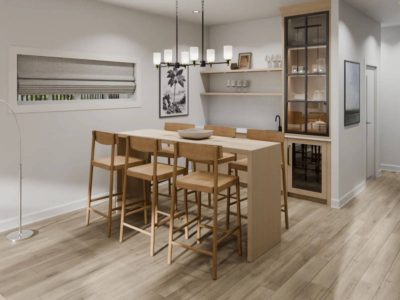 Downstairs, a built-in bar anchors the basement rec room — the space that earns its keep on long evenings, a grace note most new Abbotsford rowhomes never bother with.