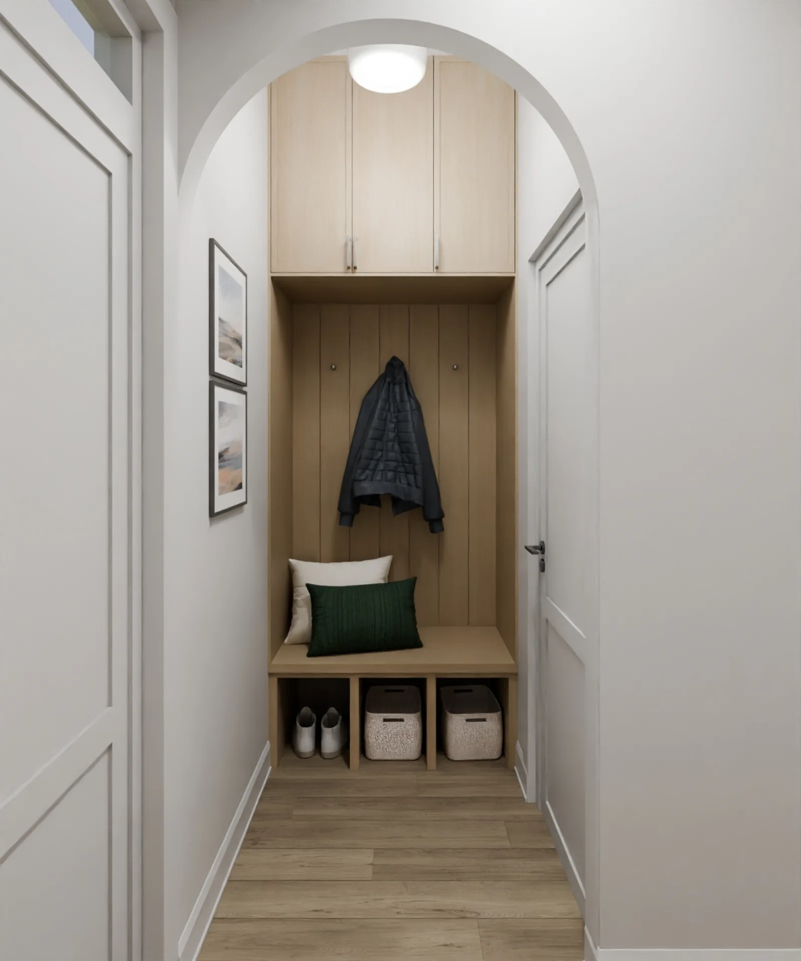 The entry welcomes before it impresses — custom millwork, soft light and the first breath of a home that's entirely your own.